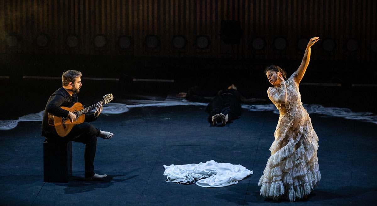 Flamenco guitarist and dancer on the stage. The Soulful Style of Soleá in Flamenco